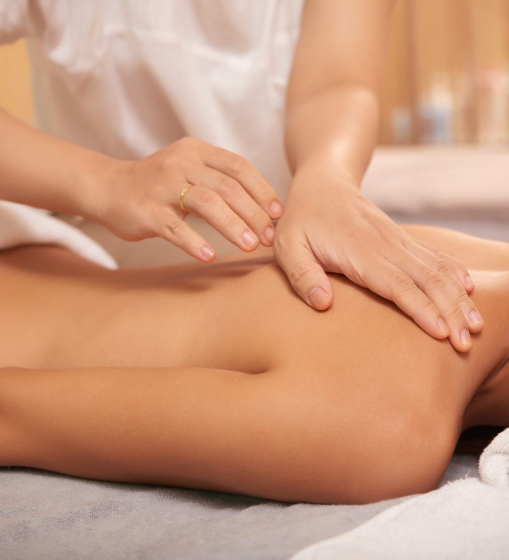 young-woman-getting-back-massage-spa-salon